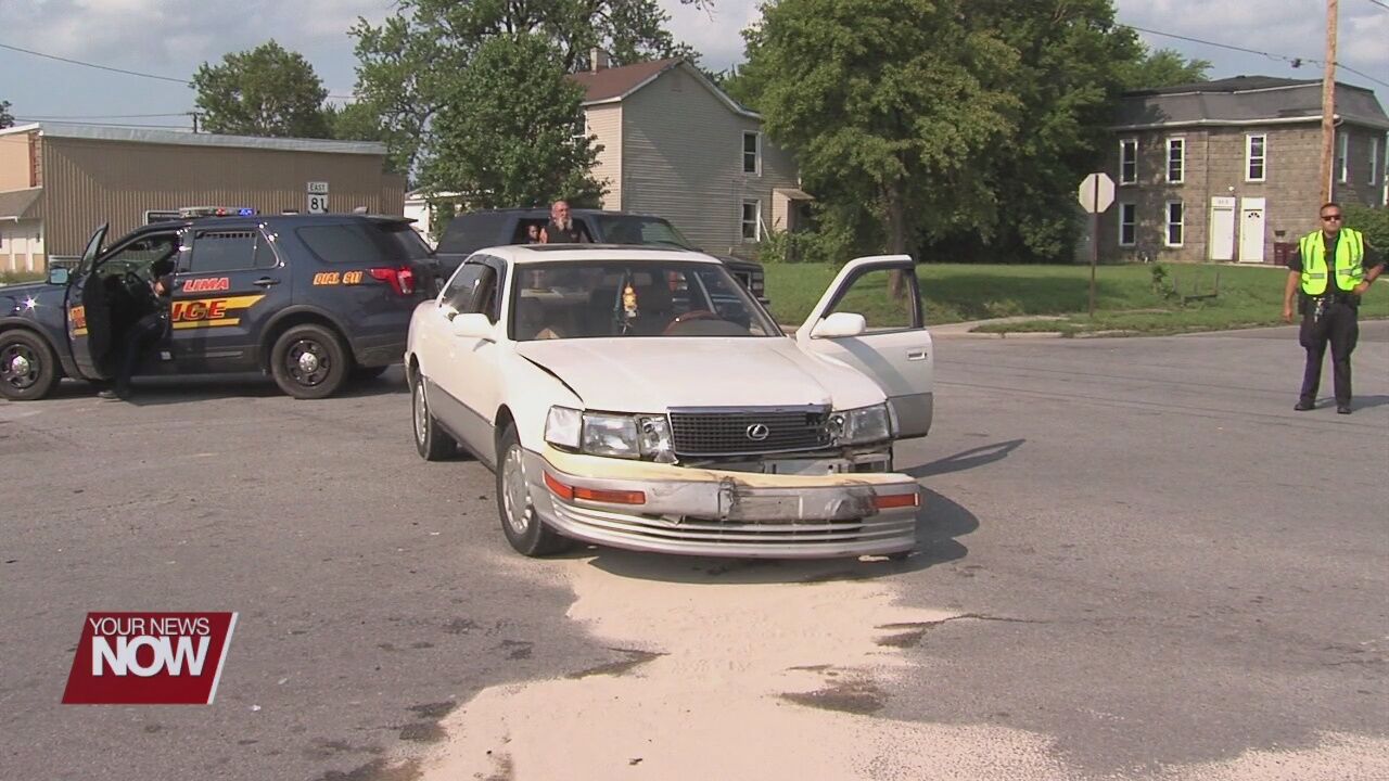 SUV rolls onto side after two-car crash in Lima